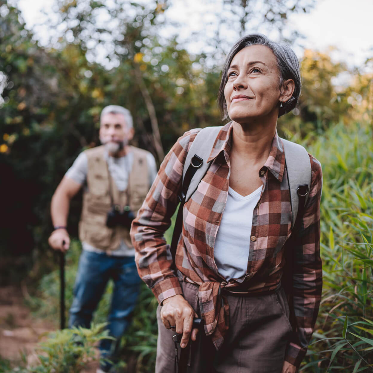 A couple hike on a trail
